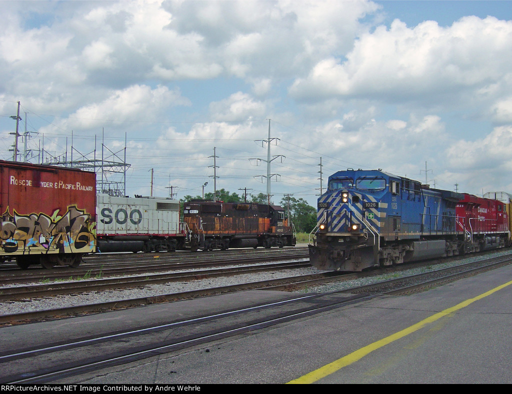CEFX 1026 leads #199 westbound passing the yard job